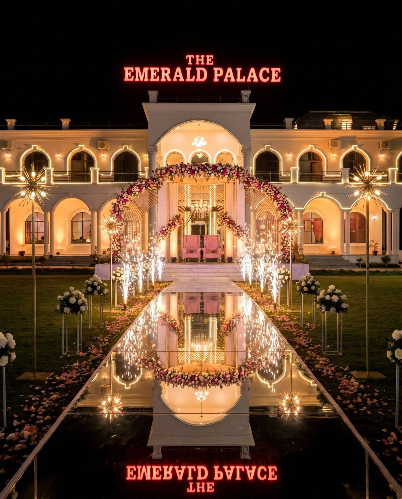 Night wedding with mirror aisle and fireworks